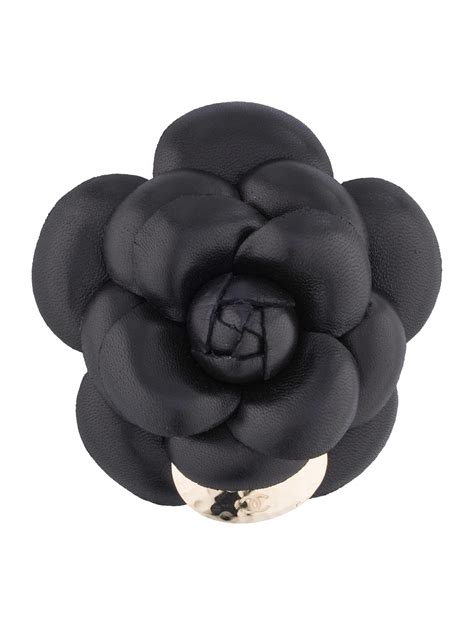 broche camélia chanel prix|Chanel camellia brooches.